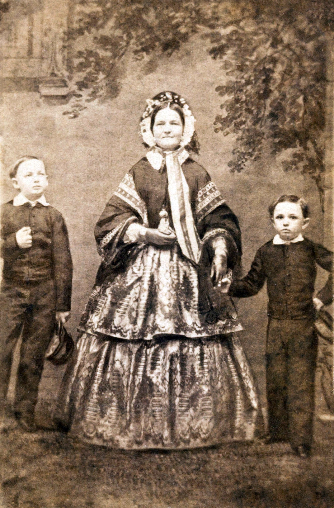Mary Todd Lincoln with two of their sons; family life amid the burdens of office.