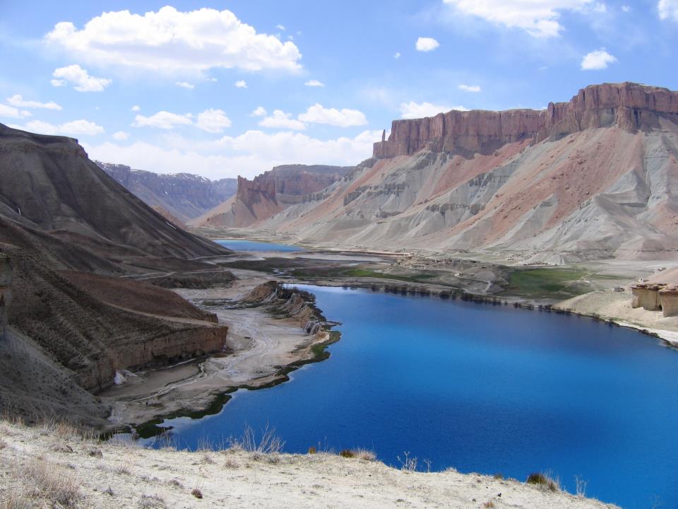The deep blue lakes of Band-e Amir, a chain of natural dams high in the mountains of Bamyan and Afghanistan's first national park. Their striking colour, set against barren cliffs, makes them one of the country's natural wonders.