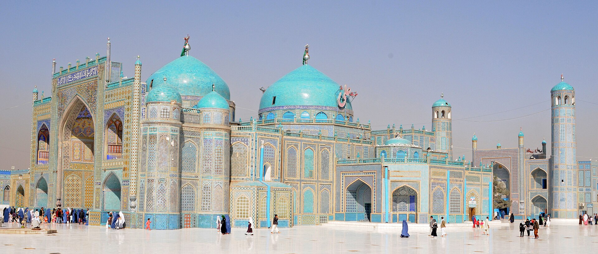 The Blue Mosque in Mazar-i-Sharif, its walls covered in brilliant tilework. Believed by many Afghans to hold the tomb of Ali, the son-in-law of the Prophet Muhammad, it is the country's most revered shrine and the focus of the spring new year festival.
