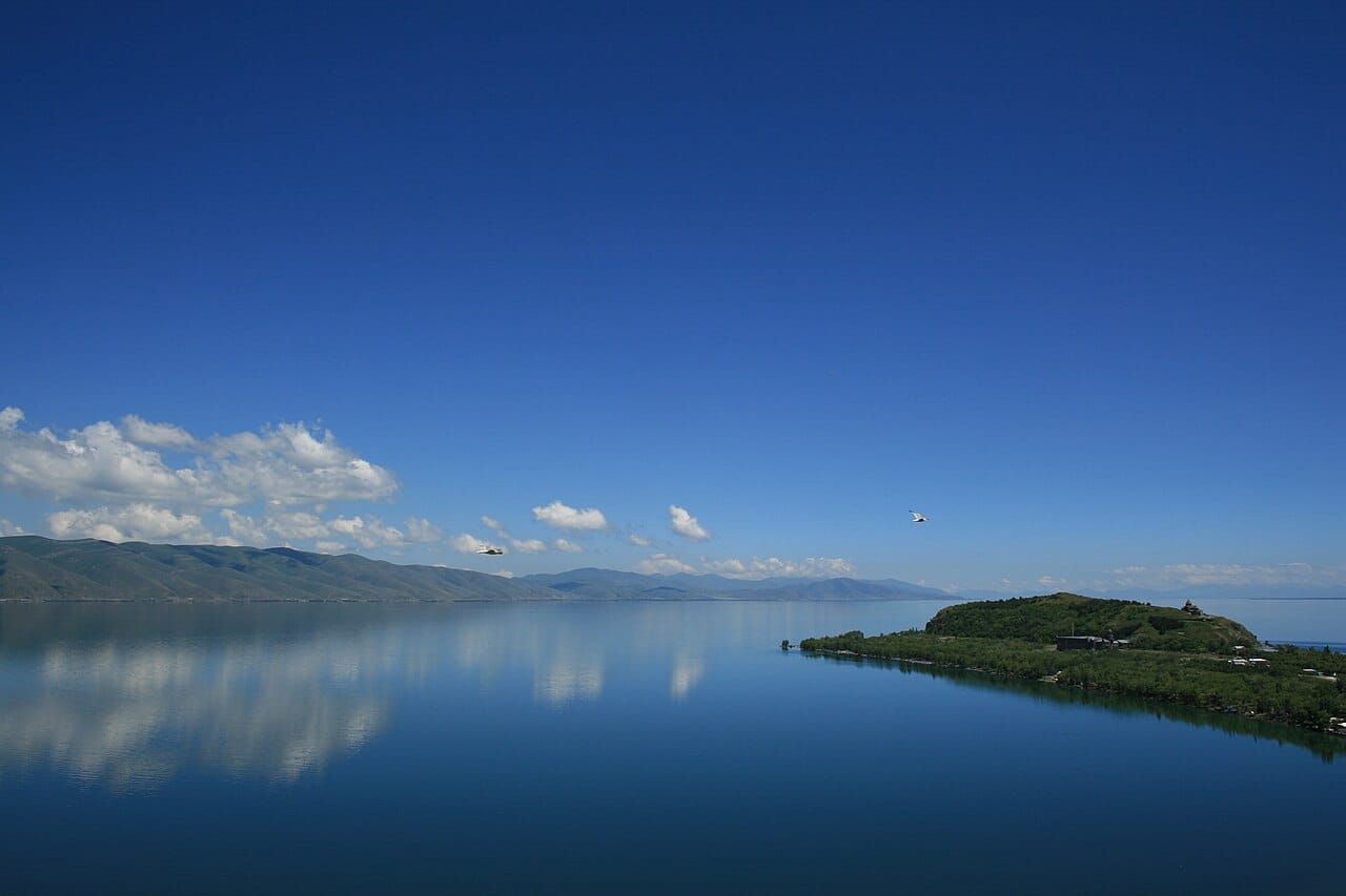 Lake Sevan, one of the largest high-altitude lakes in the world, with the peninsula of the medieval Sevanavank monastery on its shore. The alpine lake is a cherished national landscape and a source of fish and fresh water.