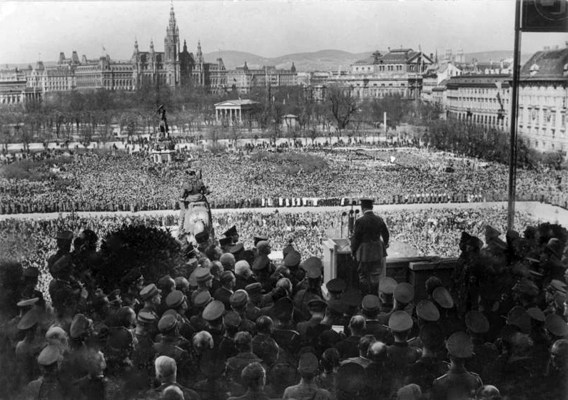 Adolf Hitler addressing a vast crowd on the Heldenplatz in Vienna in 1938, at the Anschluss that annexed Austria into Nazi Germany. The enthusiastic welcome given to Hitler in his native land would later trouble the nation's memory of the era.