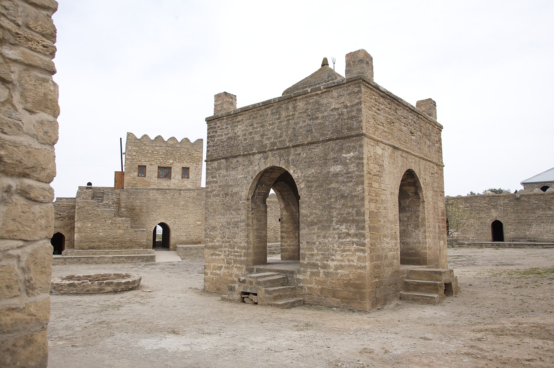 The Ateshgah fire temple near Baku, built over a natural gas vent whose eternal flame drew Zoroastrian and later Hindu worshippers. Fires like this, fed by the gas-rich ground, gave Azerbaijan its name as the Land of Fire.