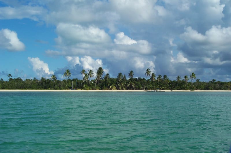 Andros, the largest Bahamian island, fringed by the third-longest barrier reef in the world and riddled with blue holes, flooded cave systems of great importance to cave diving and to the study of ancient climate.
