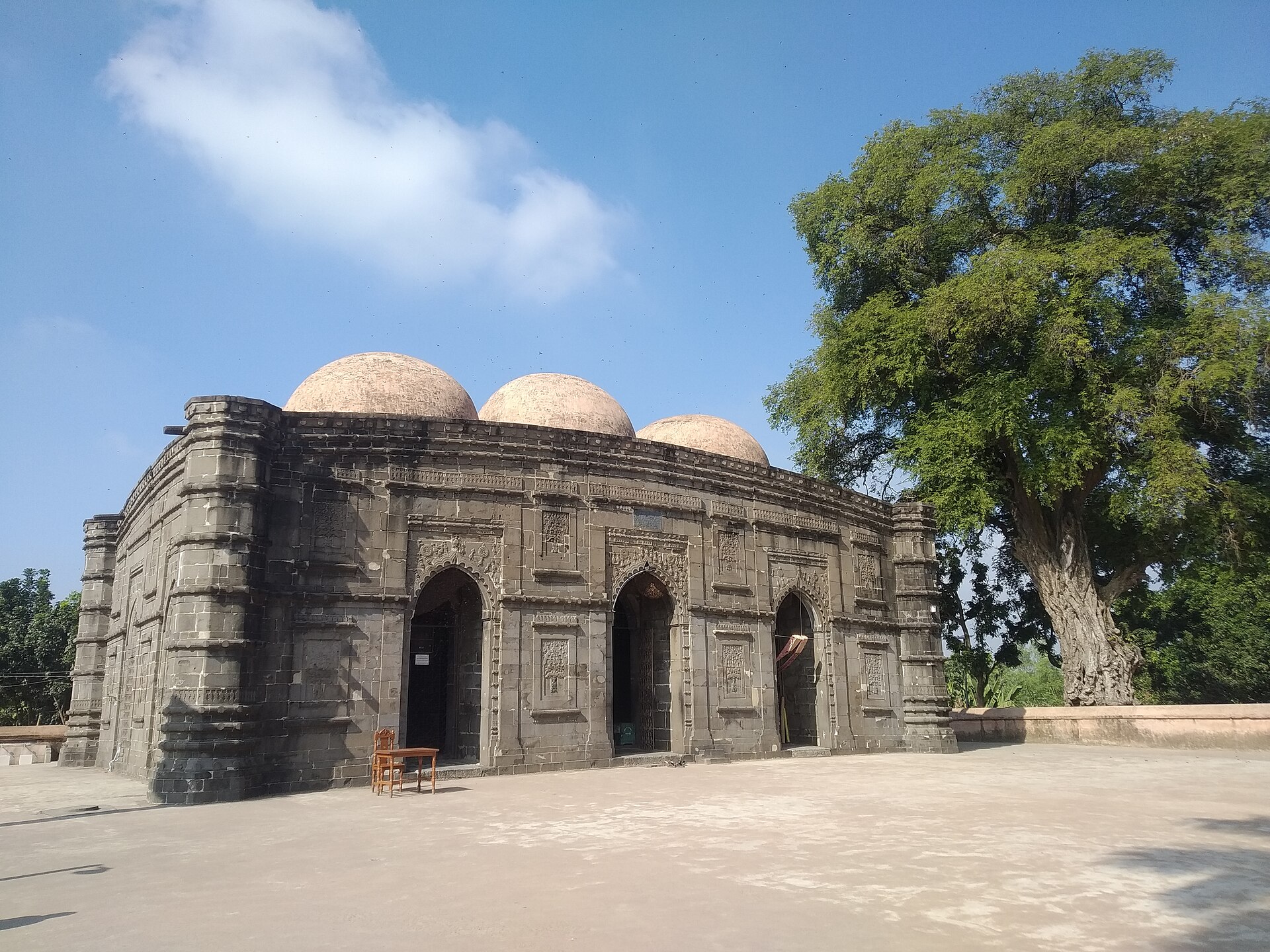 The Kusumba Mosque, a stone mosque built in 1558 in the late Bengal Sultanate. Its fine carving reflects the wealth and artistry of Bengal's Islamic heritage.