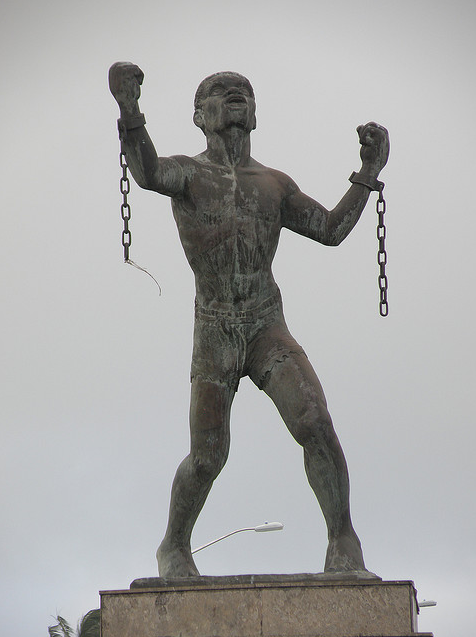 The statue of Bussa in Bridgetown, honouring the leader of the largest slave rebellion in the island's history. Credit: Dogfacebob (CC0).