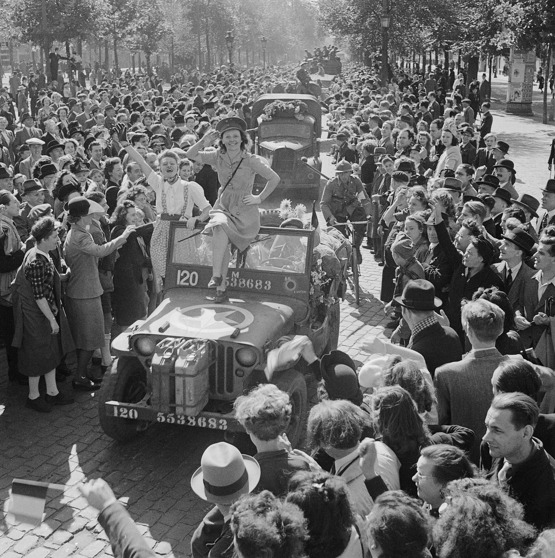 Cheering crowds greet British troops entering Brussels in 1944, at the liberation of Belgium from Nazi occupation. Twice in the twentieth century the small country was overrun and fought over by the great powers.