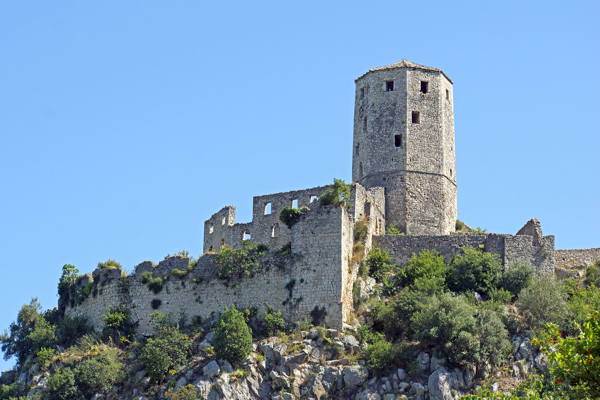 The citadel of Pocitelj, a fortified medieval and Ottoman town overlooking a river in Herzegovina. Credit: Dennis G. Jarvis (CC BY-SA 2.0).