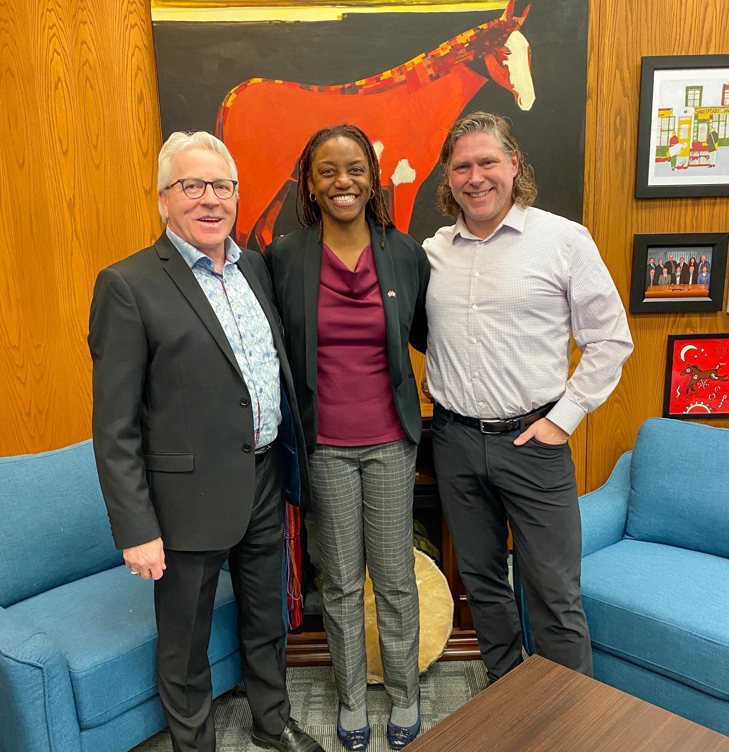 Jeff Fawcett, the mayor of Brandon, with a visiting United States consul and a member of the city council at Brandon City Hall. Elected in 2022 after years on the council, he leads the city's elected government.