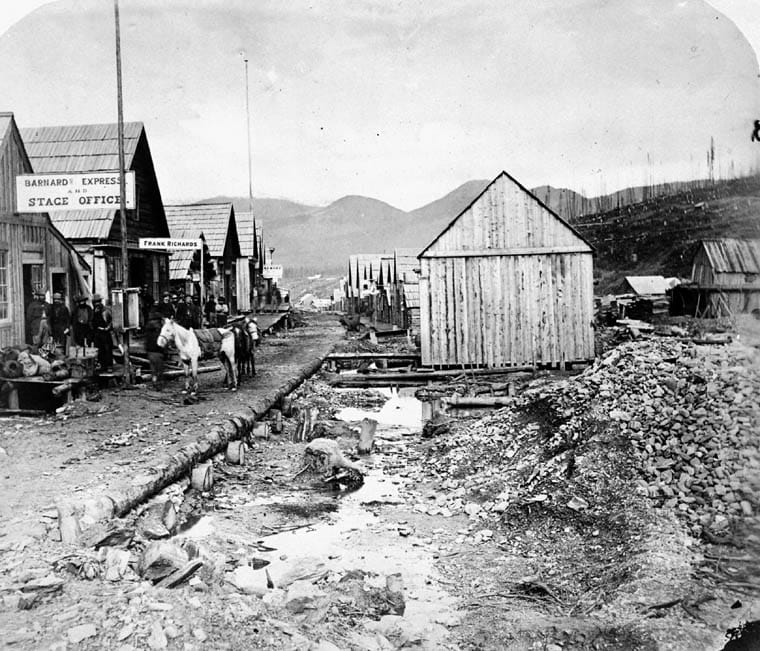 A stagecoach of the Barnard Express serving the Cariboo goldfields. The gold rushes that began on the Fraser River in 1858 drew a flood of prospectors and led Britain to establish the colony of British Columbia.