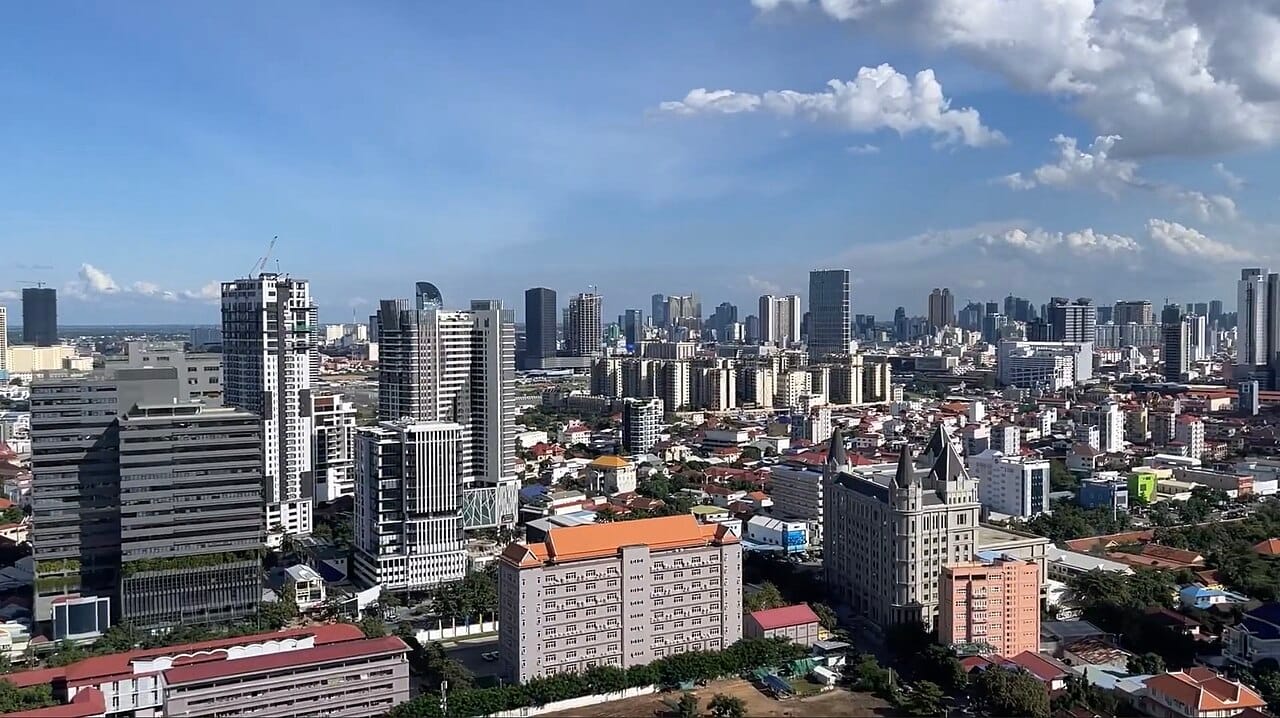 The skyline of Phnom Penh, the capital and largest city of Cambodia, on the banks of the Mekong. Once emptied by the Khmer Rouge, it has grown rapidly in recent years into the bustling heart of a recovering nation.