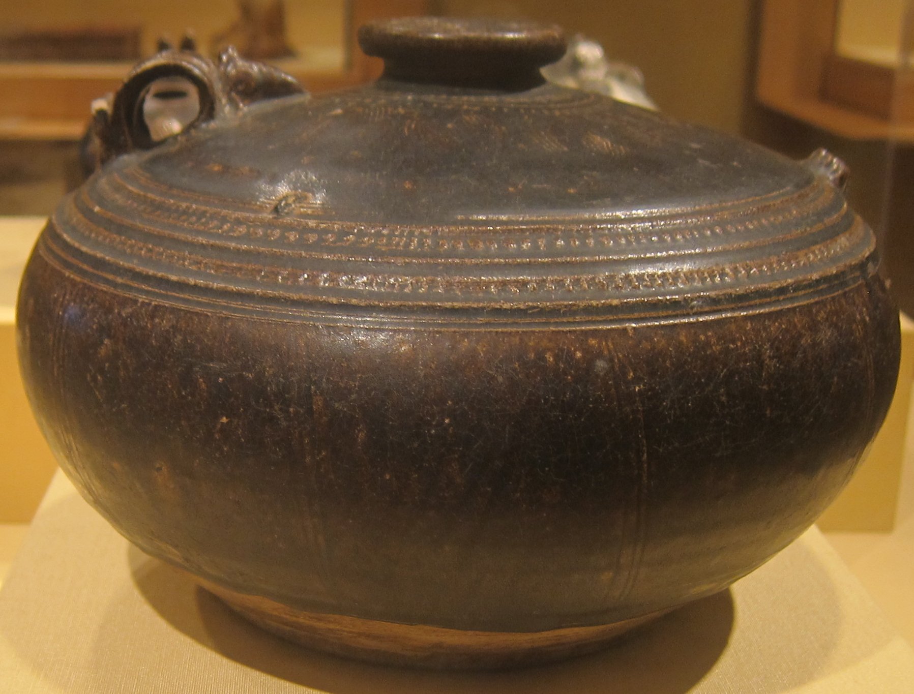A gilded ceremonial ewer from Angkorian Cambodia, made in the twelfth century. Such fine metalwork reflects the wealth and refinement of the Khmer court at the height of the empire.