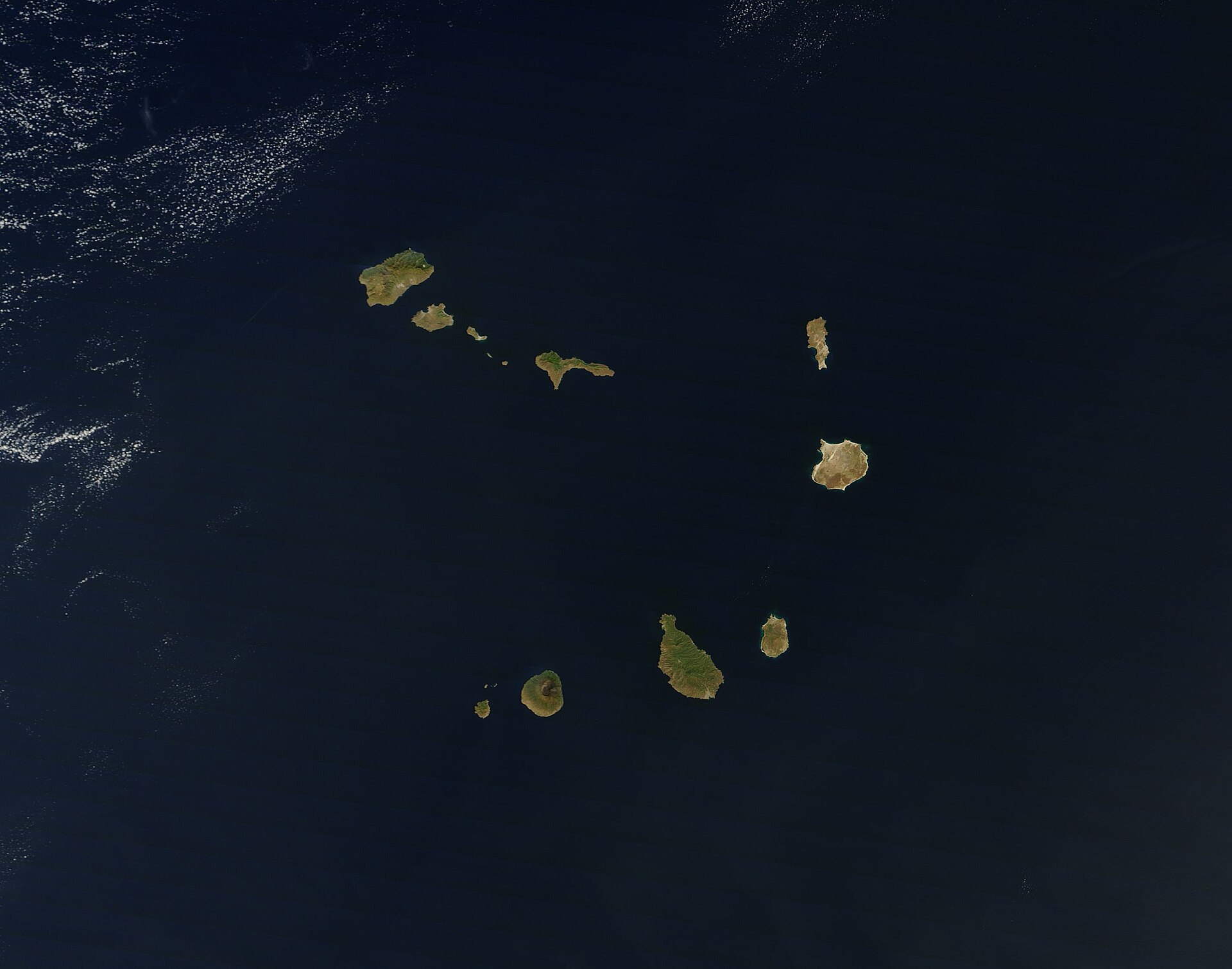 A satellite view of the ten volcanic islands of Cabo Verde, scattered across the Atlantic some 600 kilometres off West Africa. Mostly mountainous and dry, they are swept by the same winds that cross the Sahara.