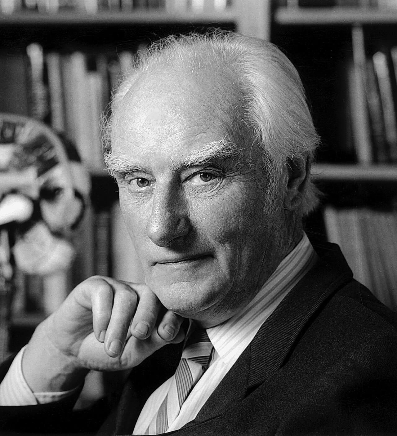 Francis Crick, who proposed the central dogma in 1957 and spent decades correcting the version of it that textbooks had adopted.