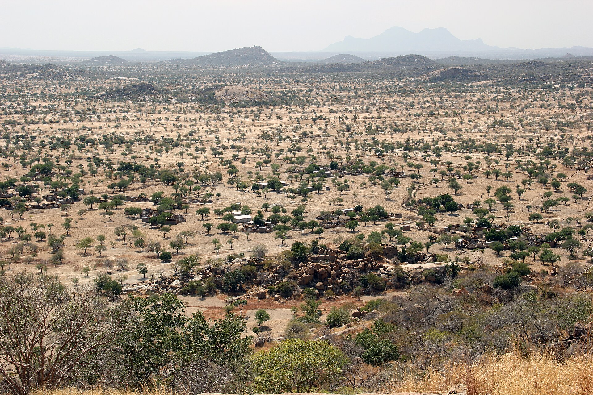 A landscape in the Guera region of south-central Chad, where rocky outcrops rise from the plains. Credit: 120 (CC BY-SA 4.0).