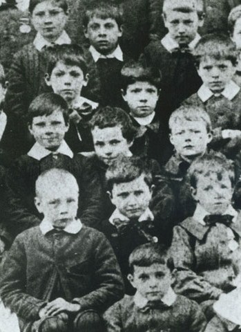 Chaplin as a seven-year-old child; he rose from a hard, poor childhood.