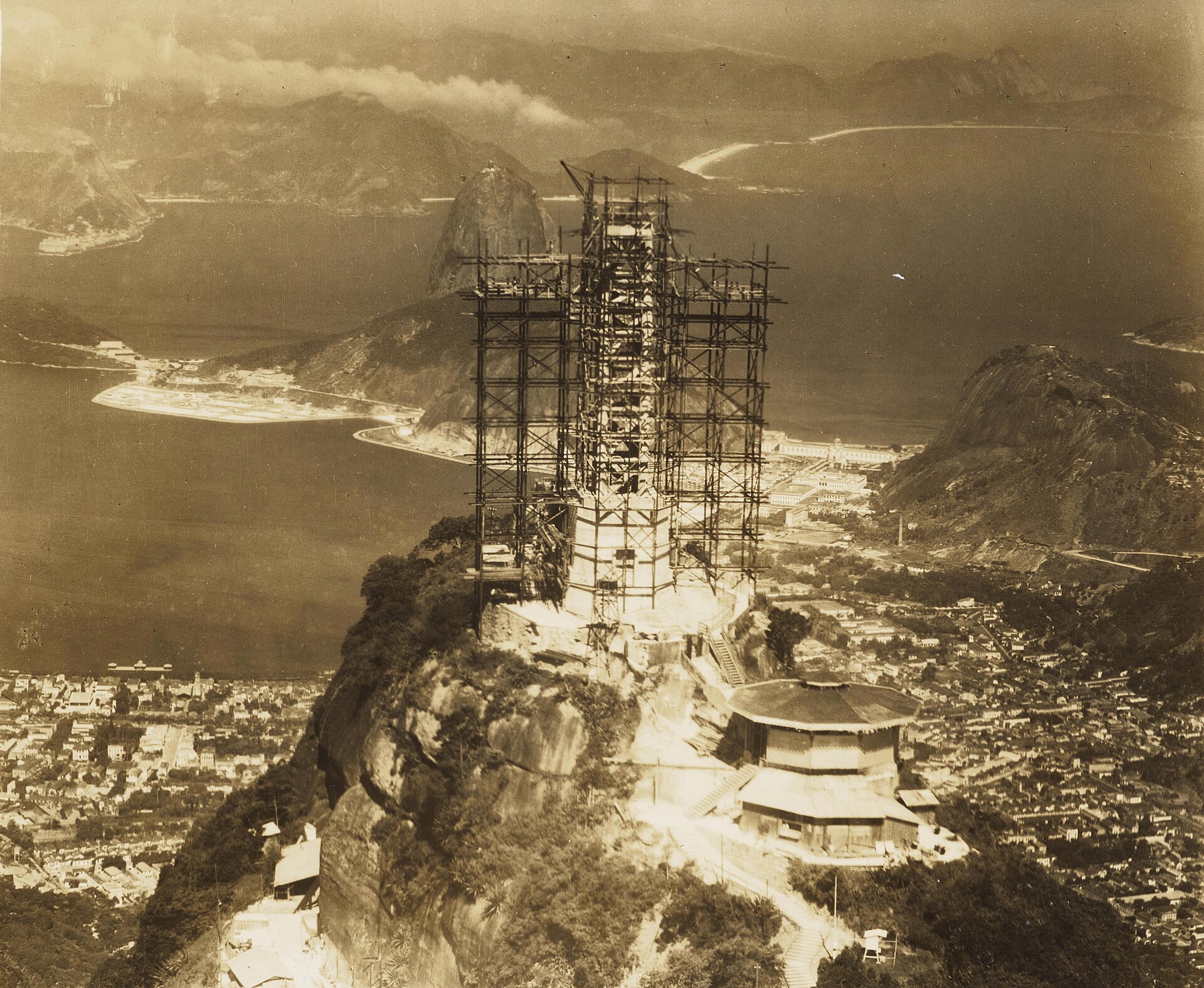 Christ the Redeemer under construction in the 1920s, before the statue was completed. Credit: Núcleo de digitalização / IMS (Public domain).