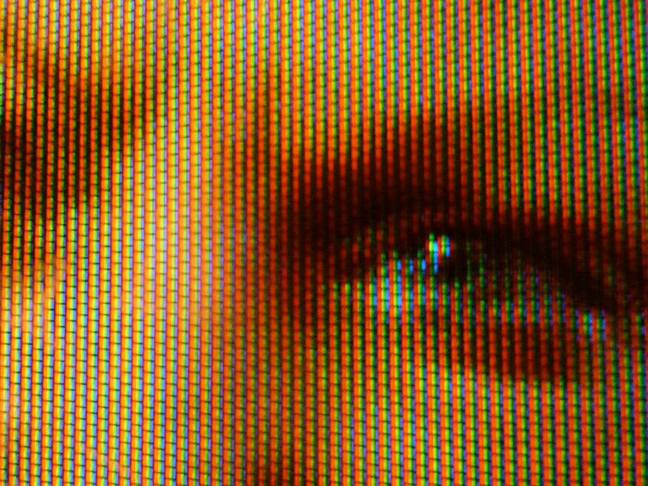 A colour television display at high magnification. Screens work by producing metamers, triples of primaries that stimulate the cones as a continuous spectrum would.