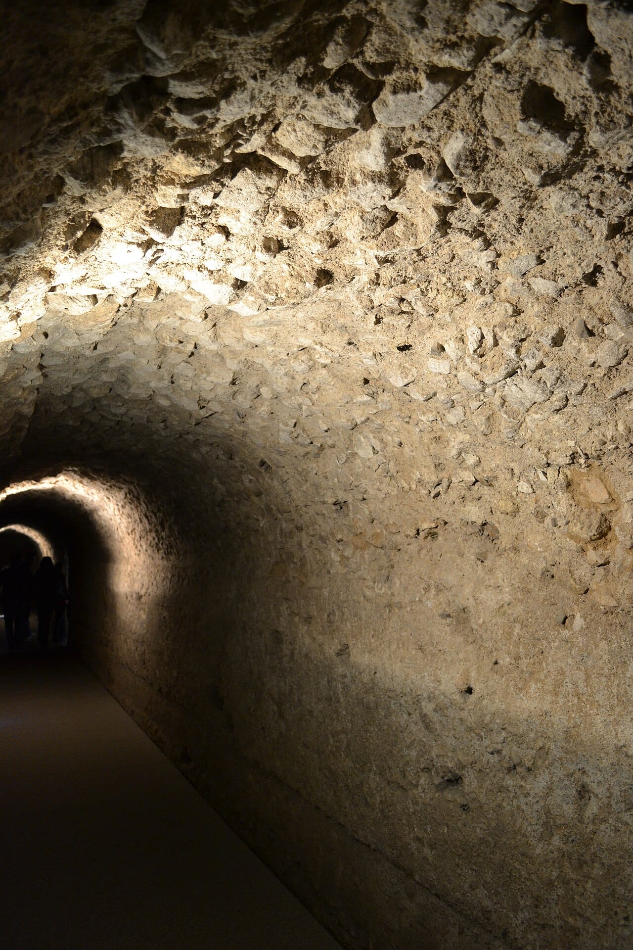 A Roman sewer built in concrete. Roman use was extensive and practical, and the technique was substantially lost in Europe after the Empire.