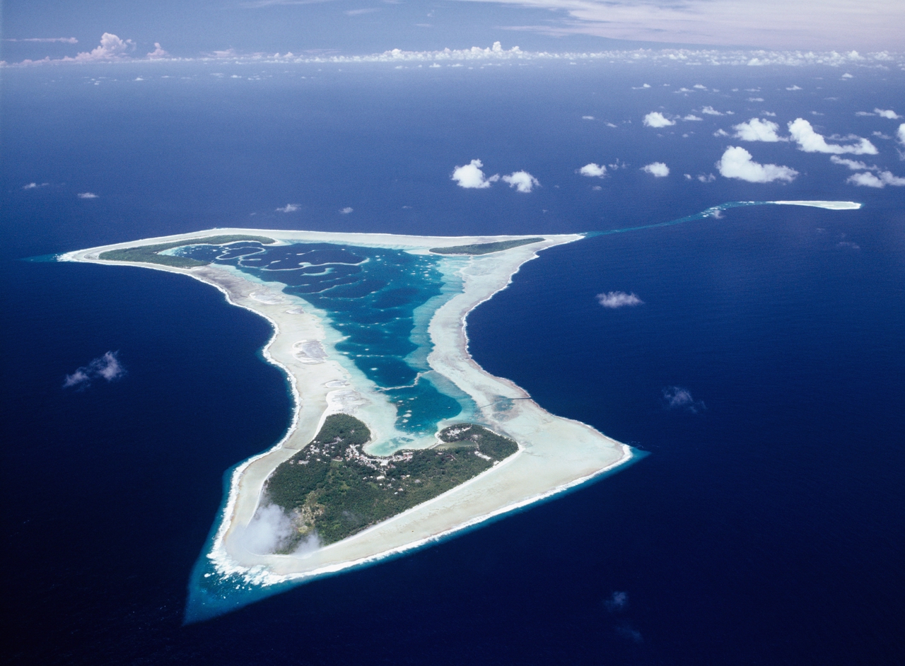 Pukapuka in the northern group, hundreds of kilometres from the capital. The northern atolls are low, remote, and acutely exposed to cyclones and rising seas, and Pukapuka's language and culture are closer to Samoa than to Rarotonga.