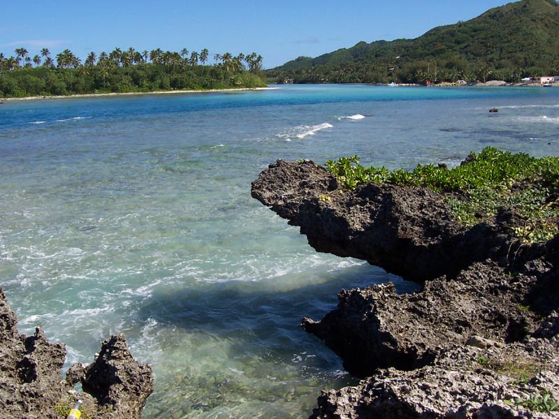 A beach on Rarotonga. Tourism, overwhelmingly from New Zealand and Australia, is by far the largest sector of the economy, alongside black pearls farmed in the northern lagoons and fishing licences.