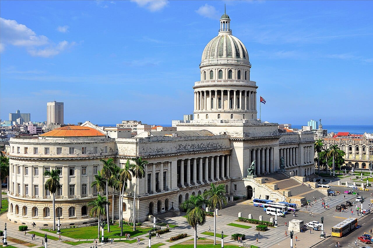 El Capitolio in Havana, modelled on the United States Capitol and completed in 1929. Once the seat of Cuba's pre-revolutionary congress, the grand dome presides over a capital that mixes faded grandeur with the hardships of the present.