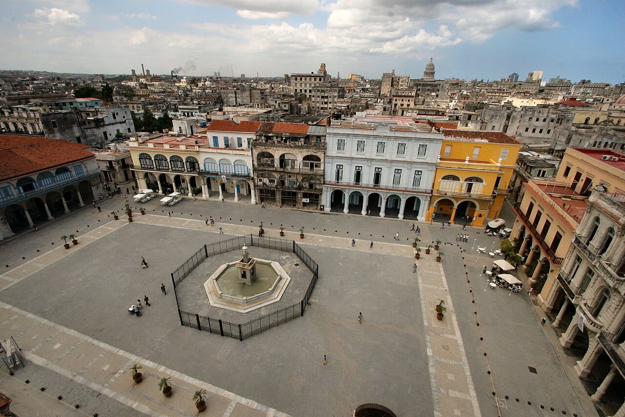 The Plaza Vieja in Old Havana, ringed by restored colonial buildings. The historic core of the capital, a World Heritage site, preserves some of the finest Spanish colonial architecture in the Americas, even as much of the city crumbles.