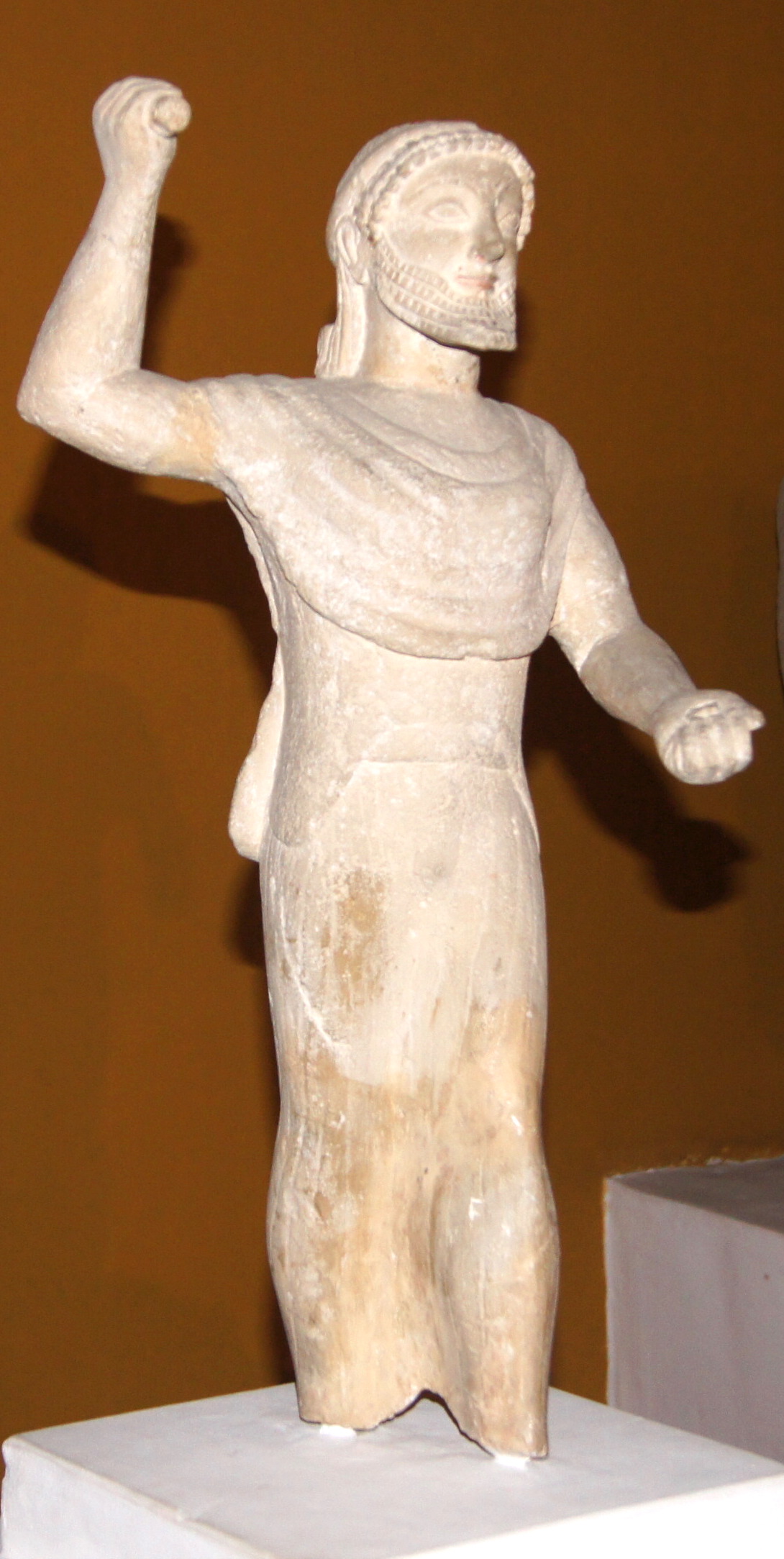 A bronze statue of Zeus from around 500 BC, in the Cyprus Museum in Nicosia. Settled by Mycenaean Greeks in the Bronze Age, Cyprus took on the Greek language and religion that have shaped its majority ever since.