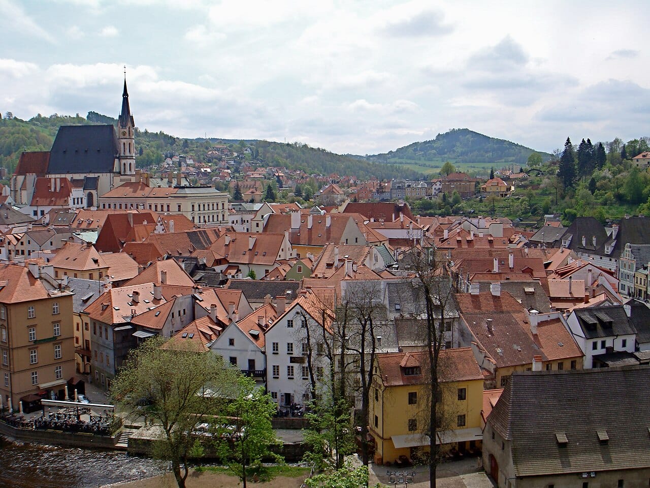 The historic town of Cesky Krumlov in southern Bohemia, wrapped in a bend of the Vltava beneath its castle. Beyond golden Prague, the Czech countryside is studded with beautifully preserved medieval towns, castles, and spa resorts.