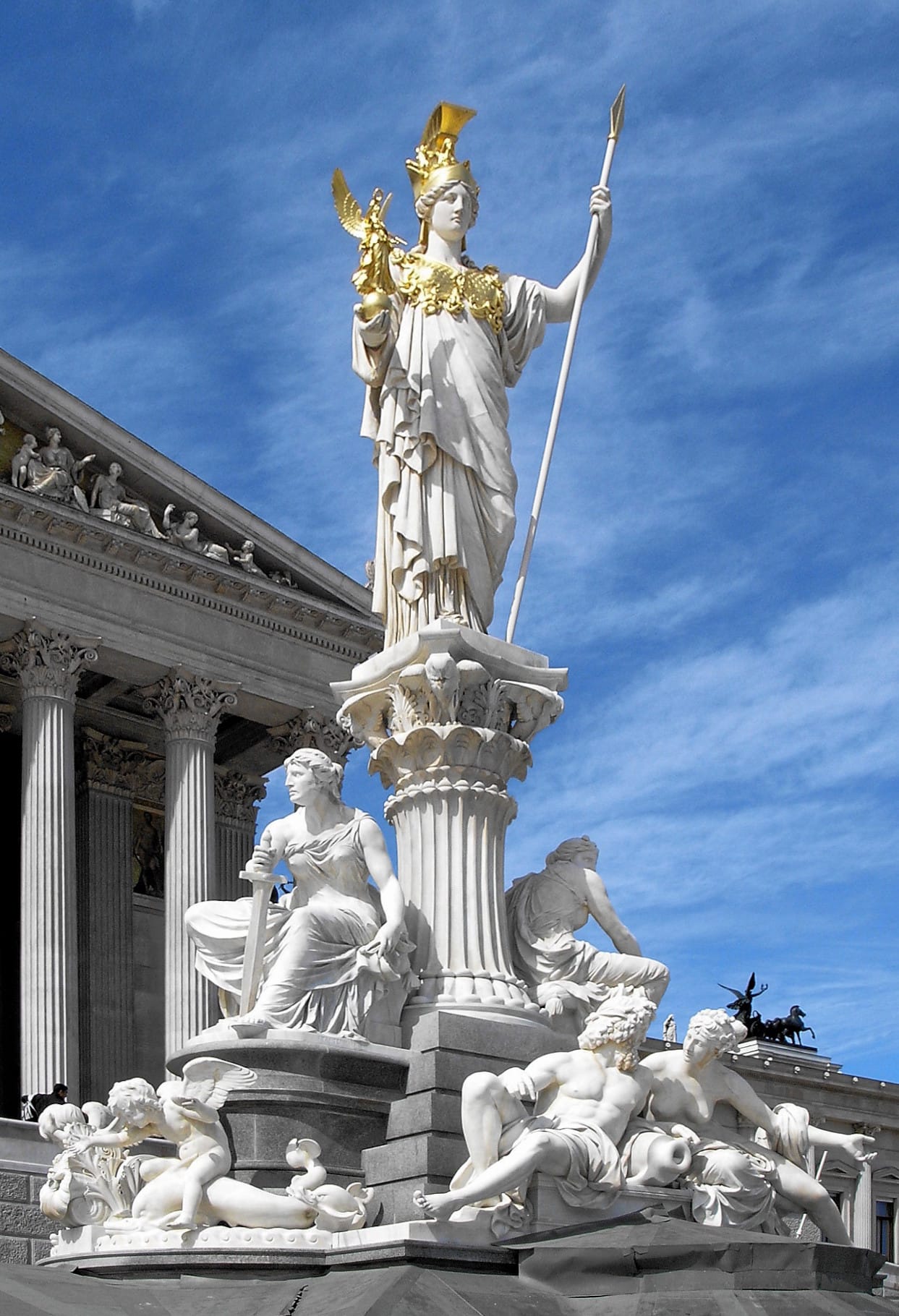 A parliament building with Athena above it. Nineteenth century legislatures deliberately invoked classical precedent, though their institutions descend more directly from medieval assemblies constraining monarchs.