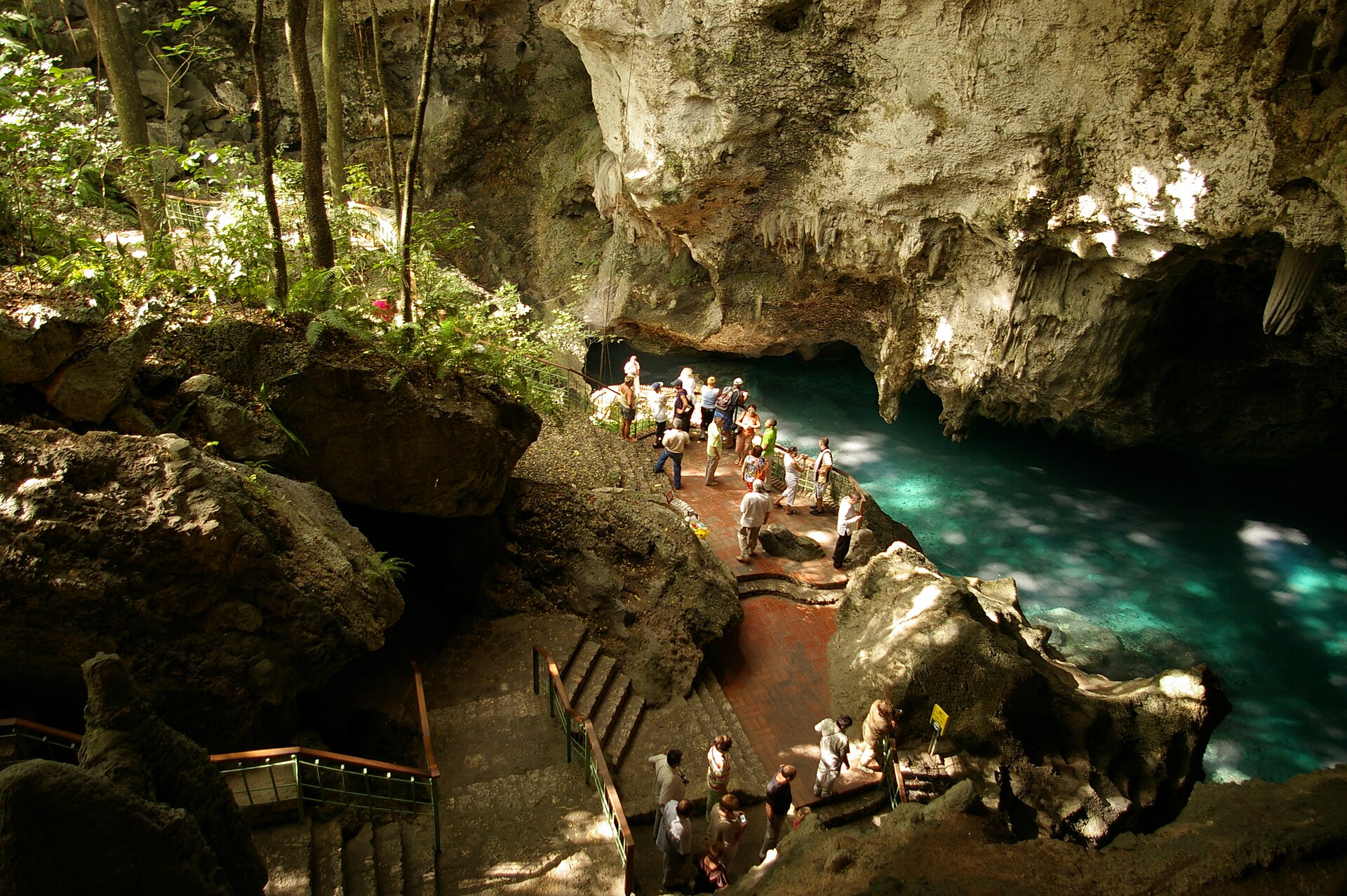 Los Tres Ojos, a set of limestone caverns and clear underground lagoons near Santo Domingo. The country packs an unusual variety of landscapes, from the highest mountains in the Caribbean to caves, valleys, and beaches, into a single island nation.