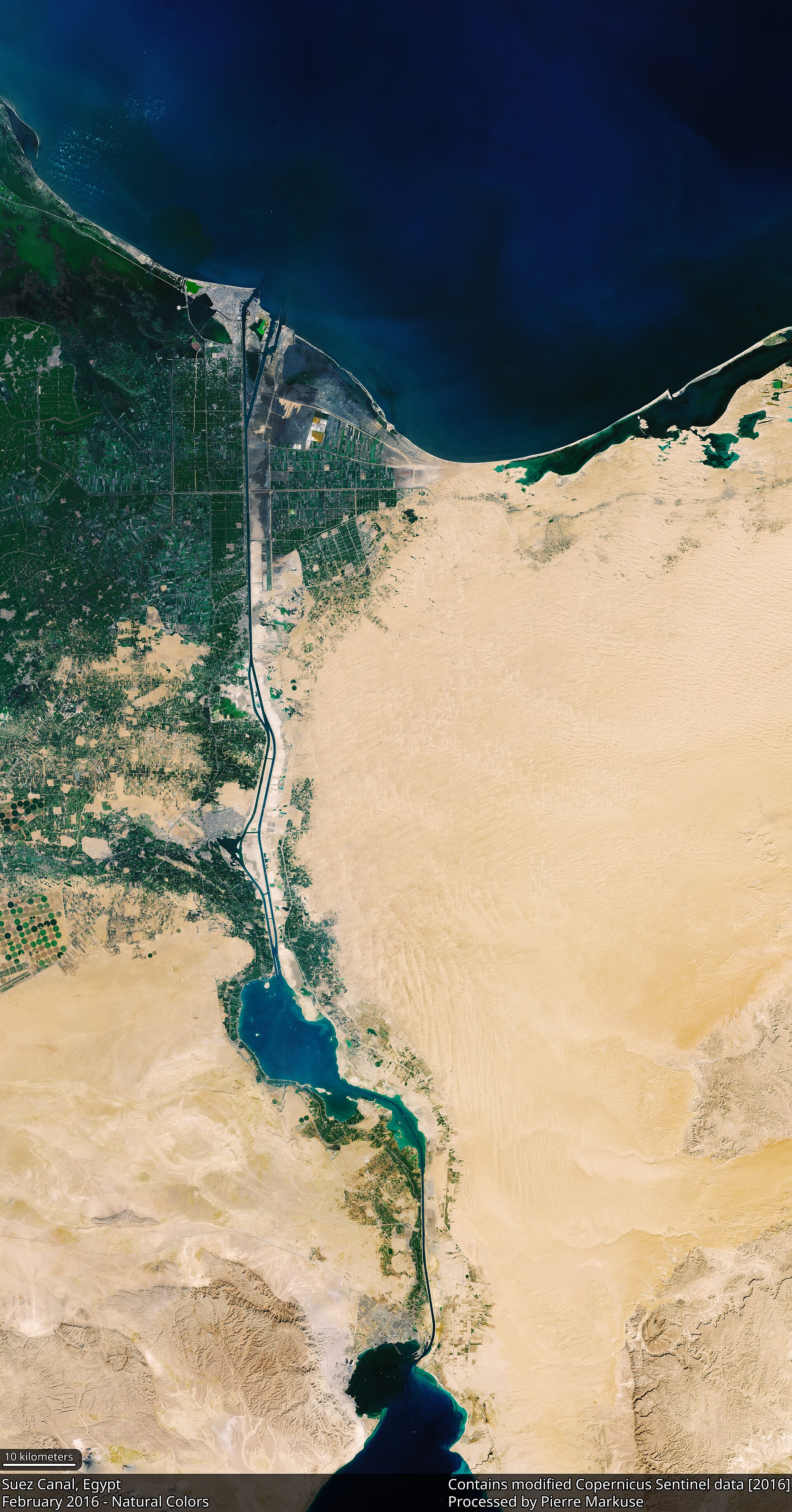 A ship in the Suez Canal, opened in 1869. The waterway links the Mediterranean and Red Seas, carrying a large share of global trade and providing Egypt with vital revenue.