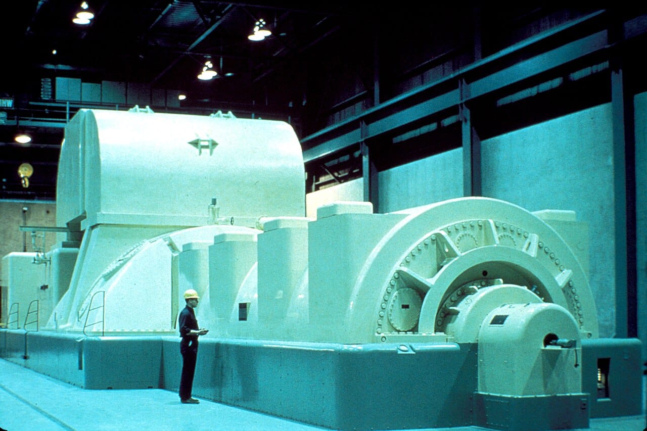 A steam turbine generator. Whatever the fuel, the conversion to electricity is the same induction Faraday demonstrated.