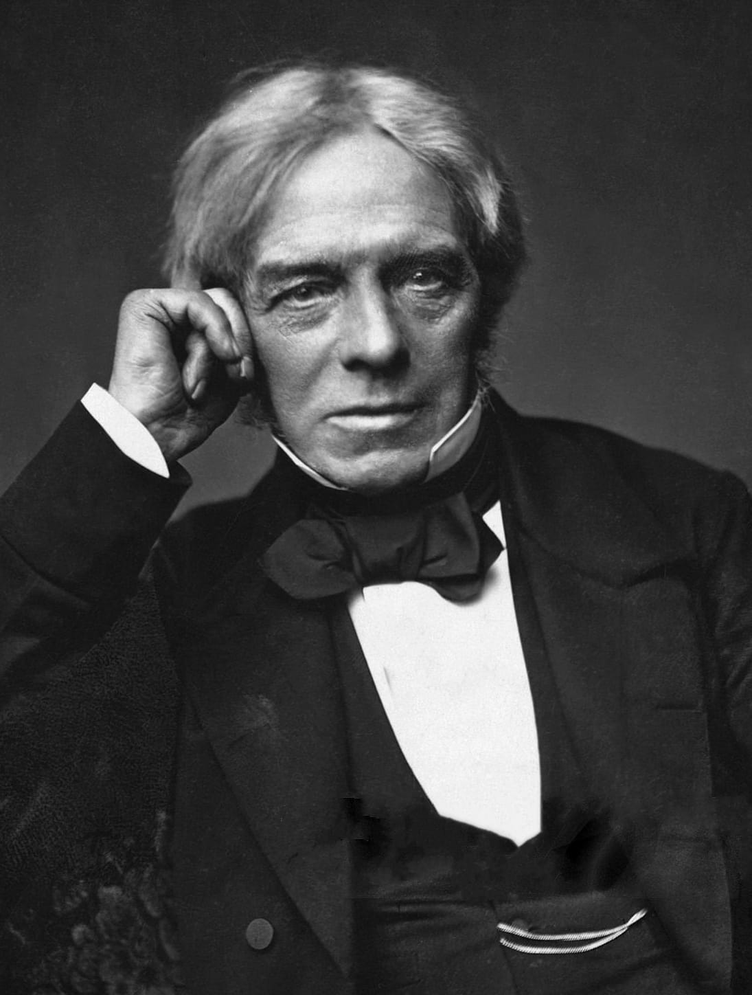 Michael Faraday, who demonstrated induction in 1831 after a decade of attempts and had almost no formal mathematical training.