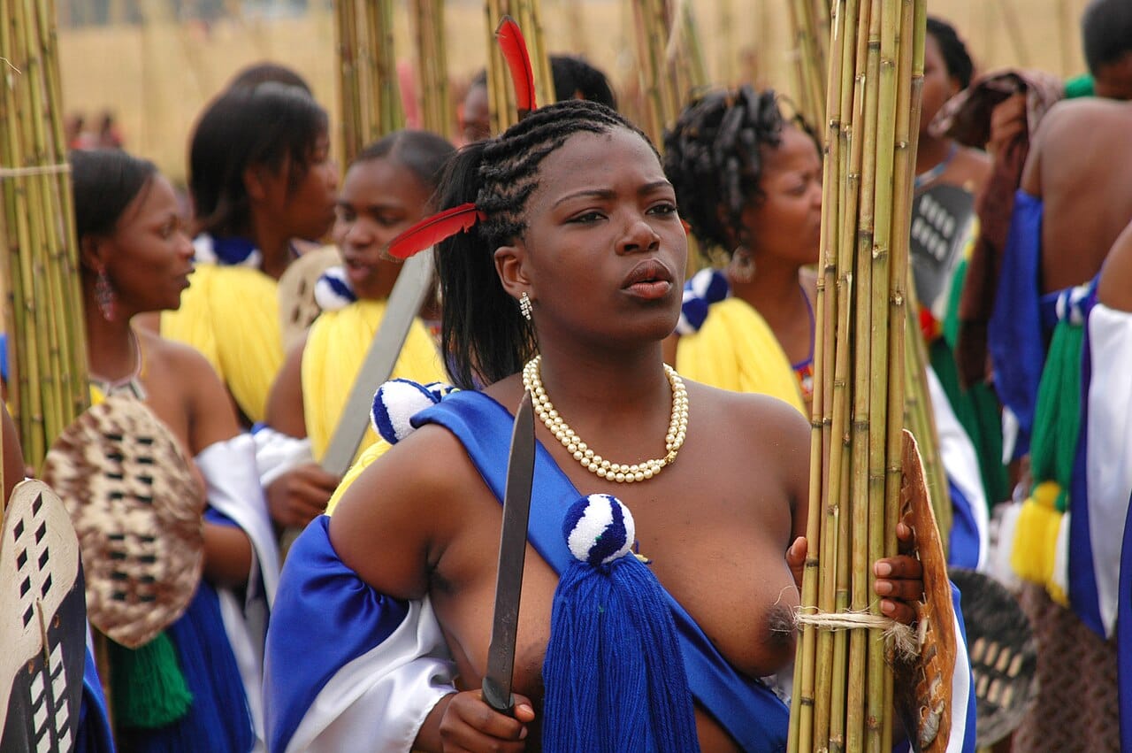 Young women dancing at the Umhlanga, or Reed Dance, one of Eswatini's great royal ceremonies. Such vivid rituals, performed before the king and queen mother, are central to Swazi identity and among the most famous living traditions in Africa.