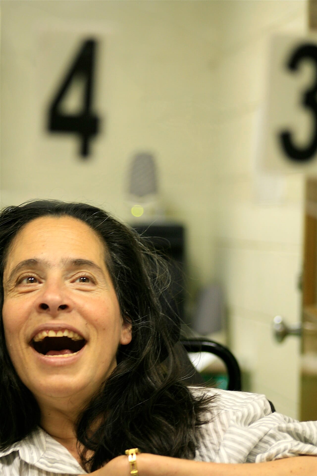 A user of augmentative and alternative communication selecting letters by eye gaze, with no physical contact from anyone else. Methods of this kind are evidence-based, are widely used, and are not what this capsule is about.