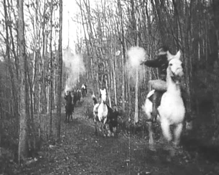 A frame from The Great Train Robbery, 1903. Its cross-cutting between separate locations required audiences to understand that simultaneous events could be shown in sequence.