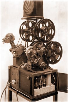 An early editing machine. Physical cutting required committing to decisions, since undoing a cut meant physically rejoining film.