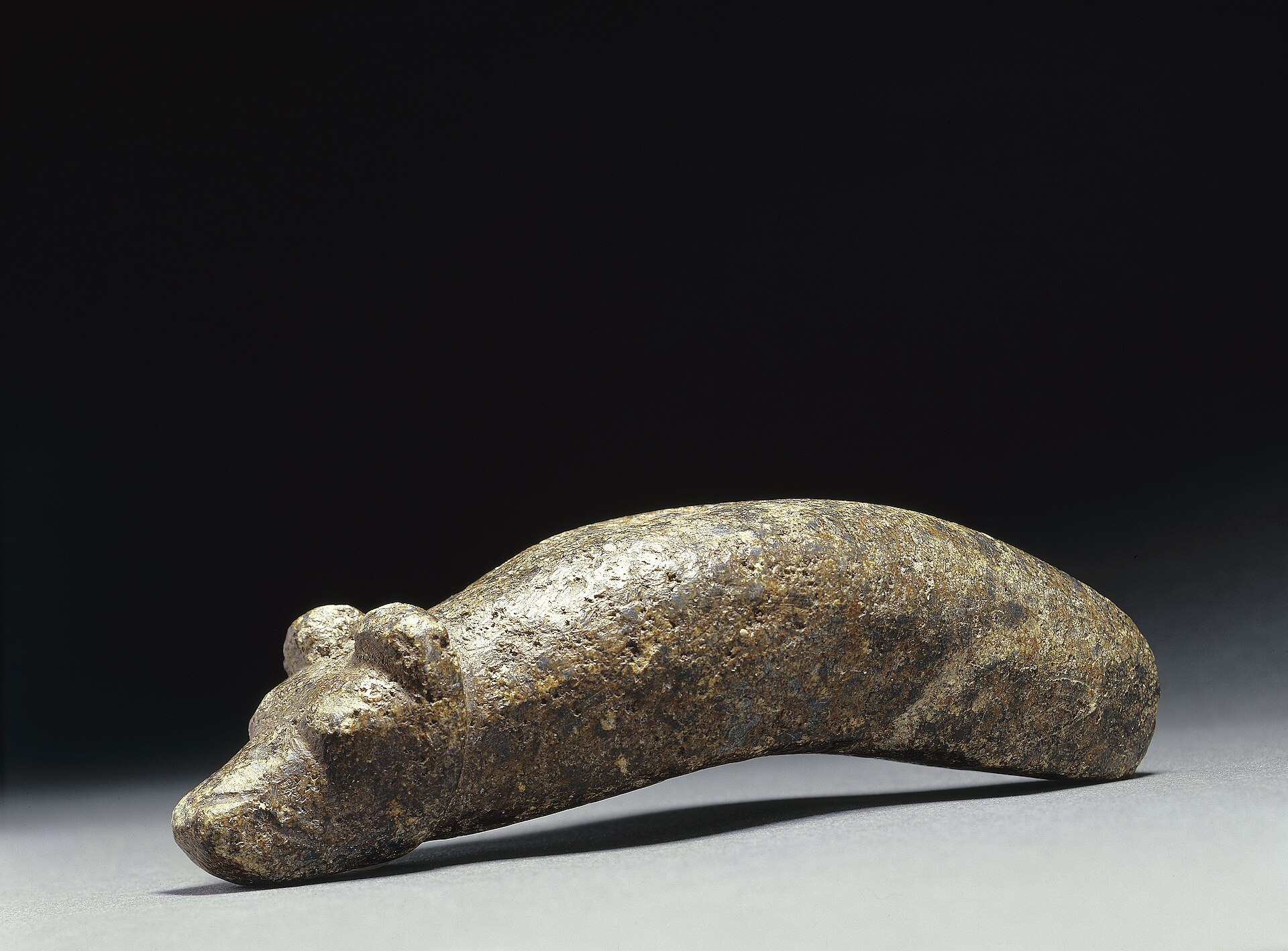 A Stone Age gavel carved as a bear's head, found at Paltamo. The bear held a sacred place in the beliefs of Finland's ancient forest peoples, whose distinctive language and folklore still set the Finns apart in northern Europe.
