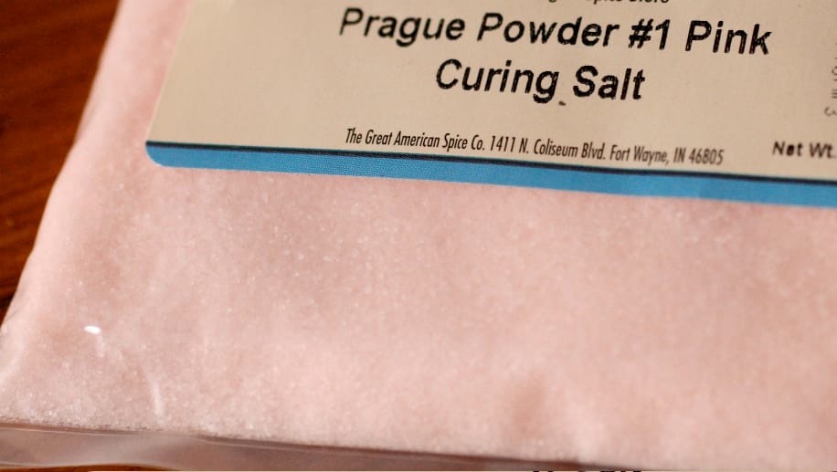 Curing salt containing nitrite. It preserves colour and flavour and, more importantly, prevents the growth of the organism causing botulism.