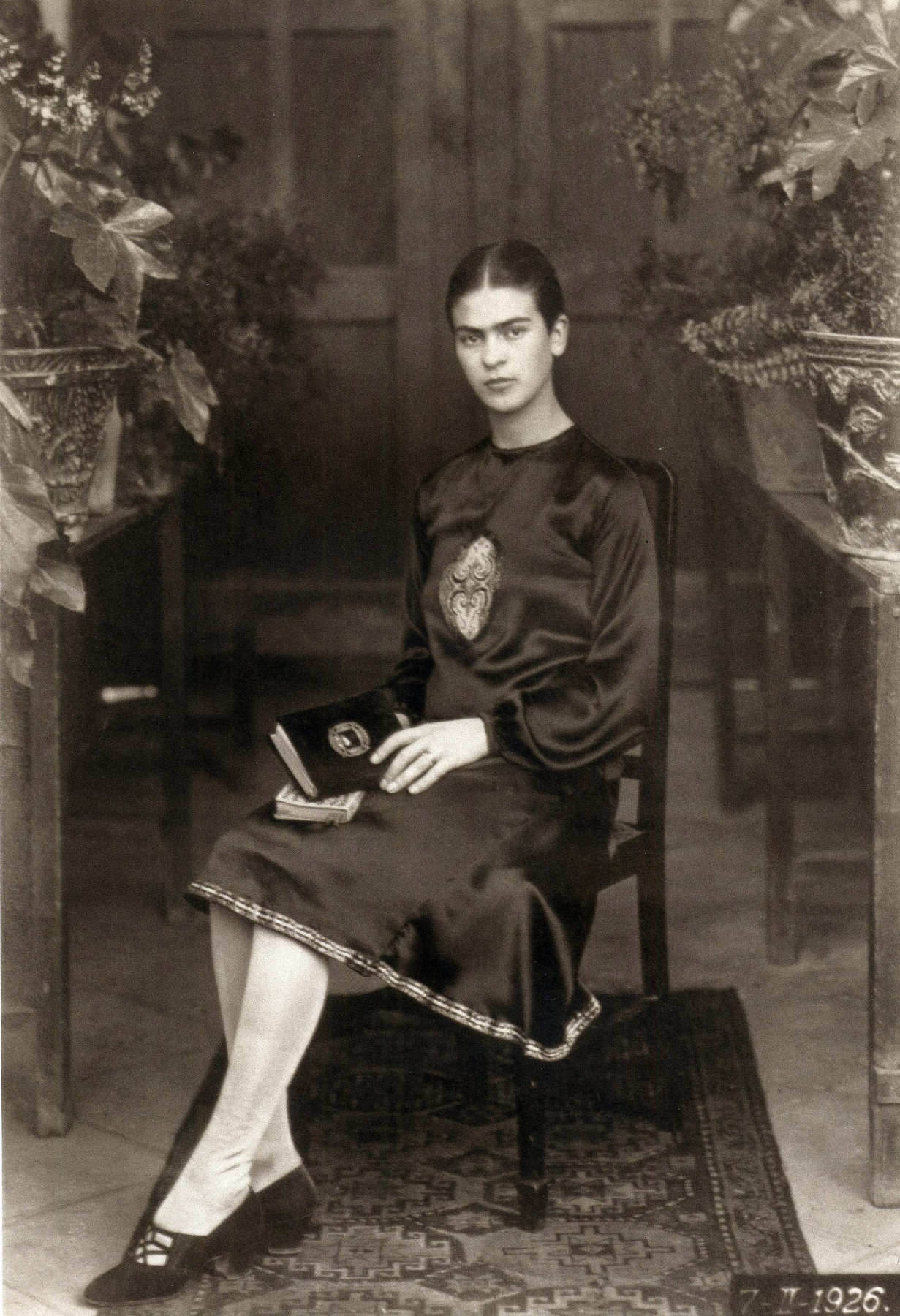 Frida Kahlo photographed in 1926, around the time she began to paint.