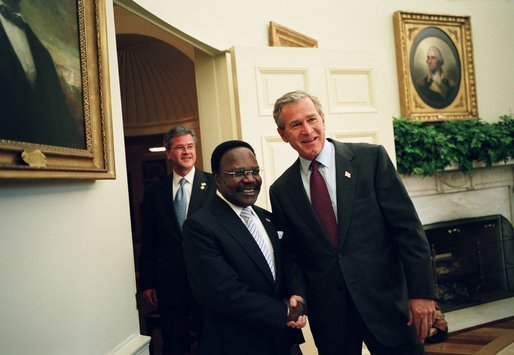United States President George W. Bush welcomes President Omar Bongo of Gabon. Bongo ruled the oil-rich country from 1967 until his death in 2009, sustained by petroleum and by close ties to Western and French interests, before his son took over.