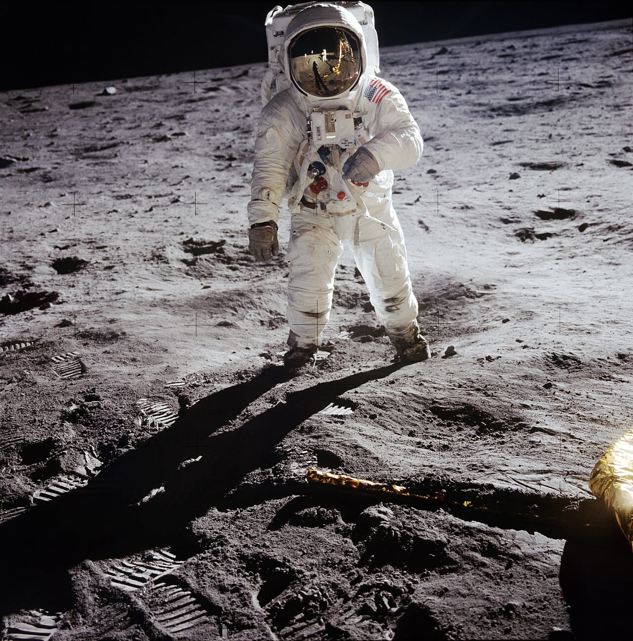 Apollo samples returned from the lunar surface. Oxygen isotope measurements on them match Earth to within parts per million, which the standard impact model does not predict.