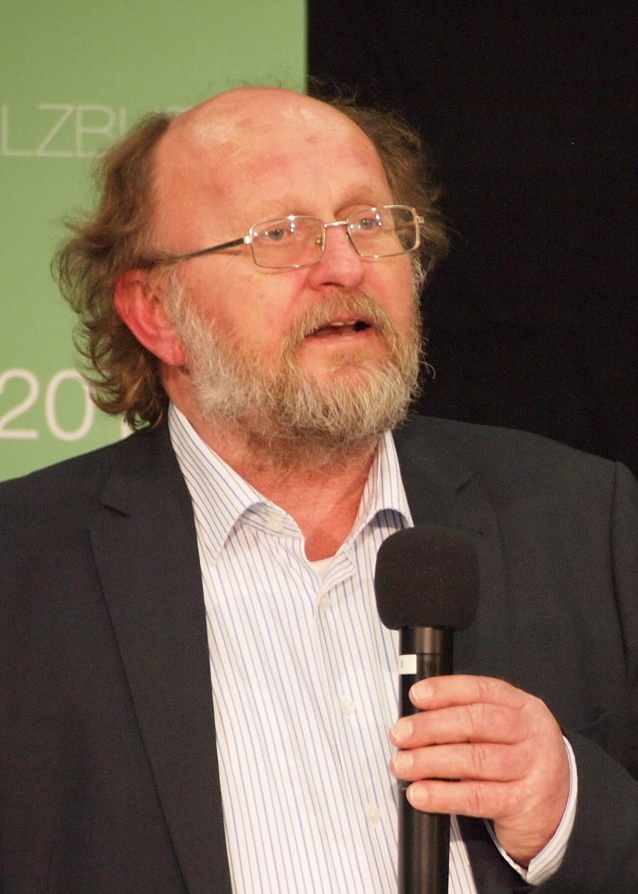 Klaus Schmidt, who excavated the site from 1995 and argued that it was a sanctuary built by hunter-gatherers, and that the demands of building it may have driven the adoption of farming rather than following from it.