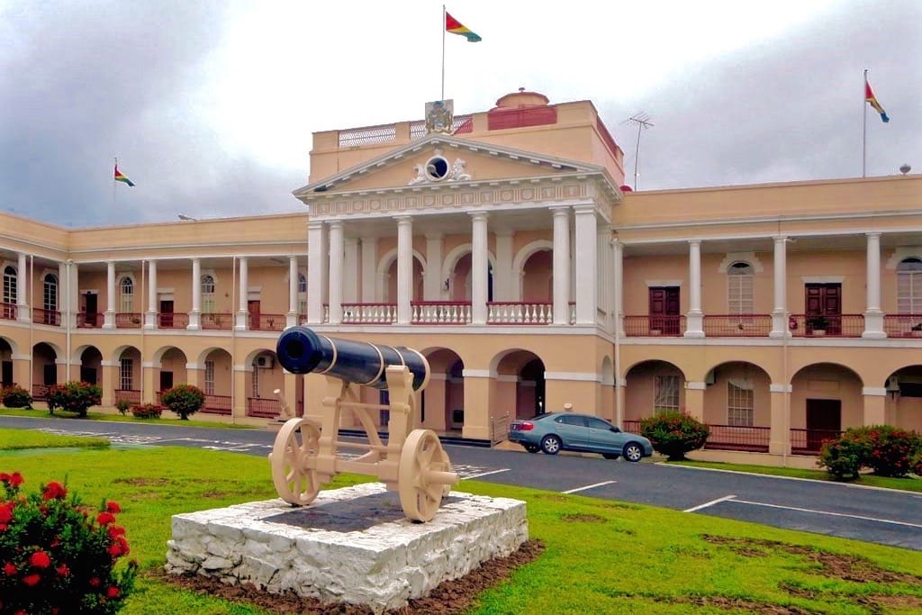 The Parliament Building in Georgetown, seat of Guyana's National Assembly. The country's democracy is vigorous but strained by the long rivalry between its Indo-Guyanese and Afro-Guyanese communities.