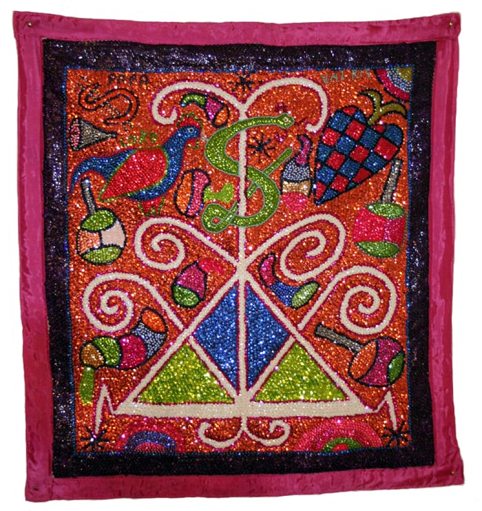 A Vodou ceremony. Grown from West African religion blended with Catholic elements, Vodou is a structured faith honouring a pantheon of spirits and the ancestors, and bears no relation to the caricature known abroad.