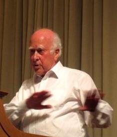 Peter Higgs, who predicted the particle nearly fifty years before it was found.