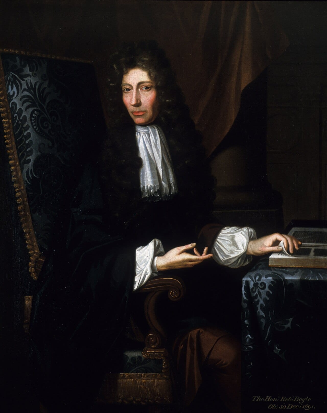 Robert Boyle, whose 1662 measurements established that the pressure and volume of a gas are inversely proportional at fixed temperature.