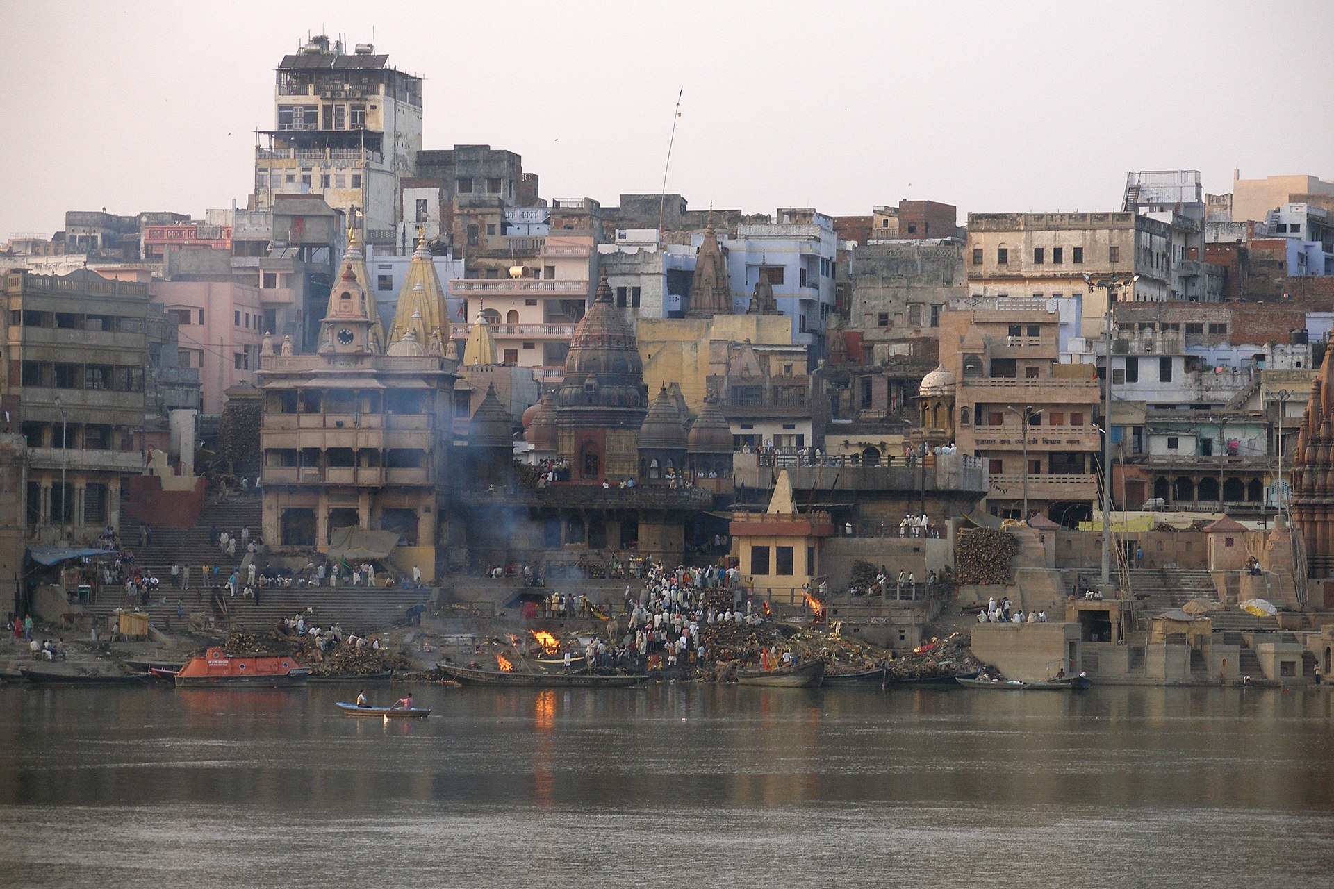 Varanasi on the river Ganges, among the holiest cities in Hinduism. Pilgrims have bathed in the sacred river and cremated their dead on its banks here for thousands of years.