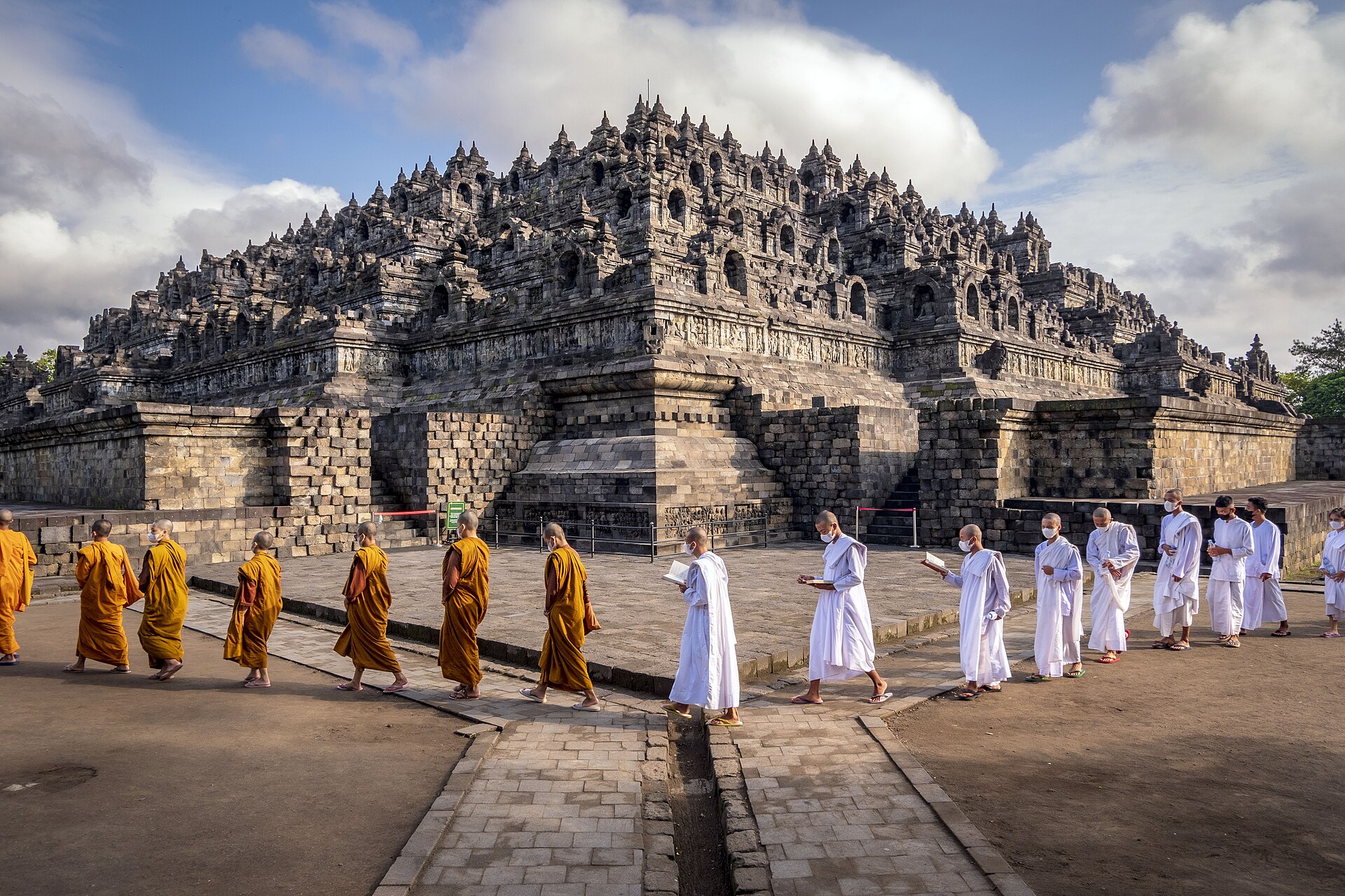 Borobudur on Java, built around the ninth century. The largest Buddhist temple in the world, its terraces are carved with thousands of relief panels and crowned with bell-shaped stupas.