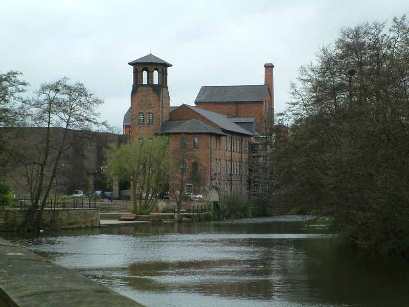 An early factory site, where workers and machines were gathered together.